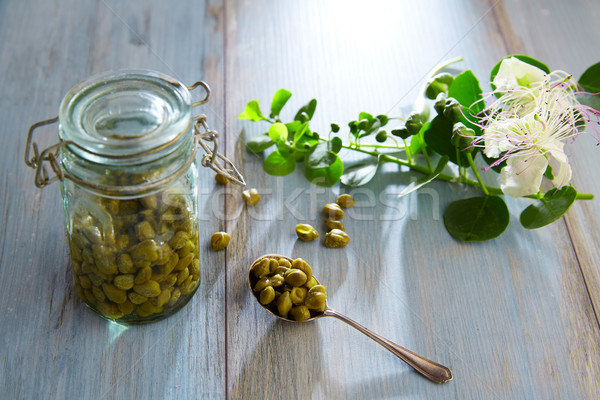 Capers pickled with plant and caper plant flower Stock photo © lunamarina