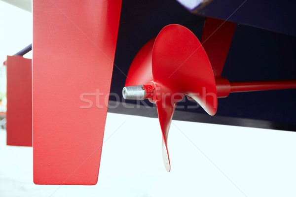 Boat red paint propeler helix in blue hull boat Stock photo © lunamarina