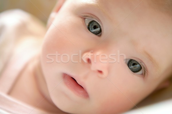 Blond little baby laying on bed portrait Stock photo © lunamarina