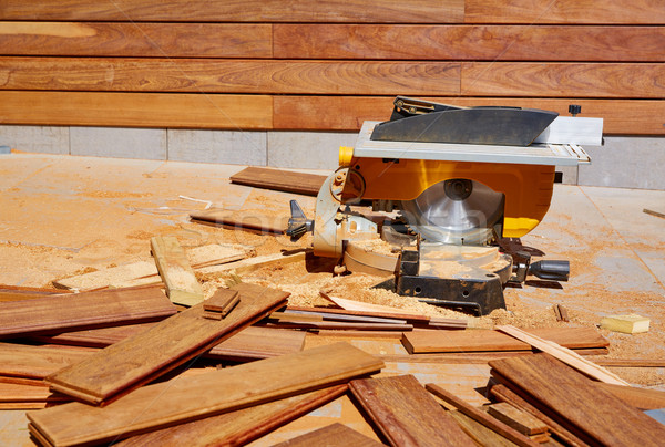 Stock photo: Ipe wood fence installation carpenter table saw