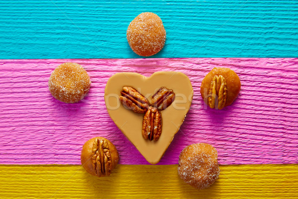 Mexican candy sweets cajeta heart with pecan Stock photo © lunamarina