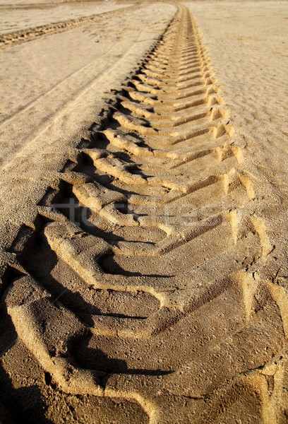 tractor tires pneus footprint printed on beach sand Stock photo © lunamarina