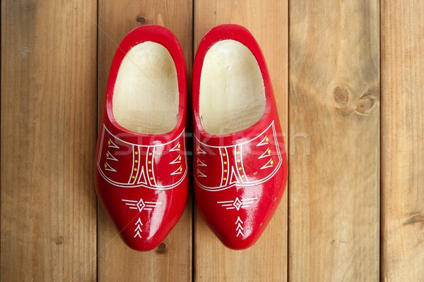 Dutch Holland red wooden shoes on wood Stock photo © lunamarina