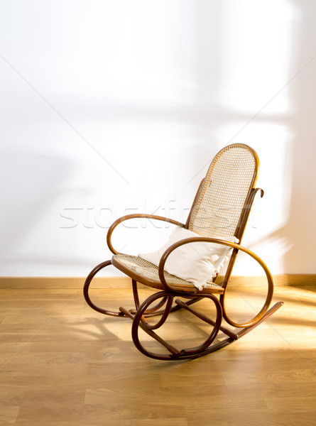 Golden retro rocker wooden swing chair on wood floor Stock photo © lunamarina