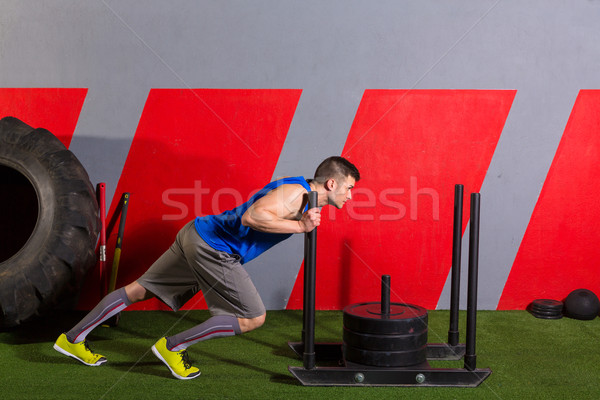 Stock photo: sled push man pushing weights workout exercise