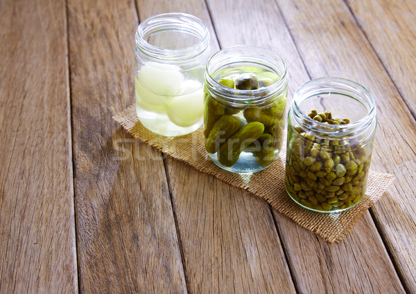 bottled pickles as capers onion and cucumbers Stock photo © lunamarina