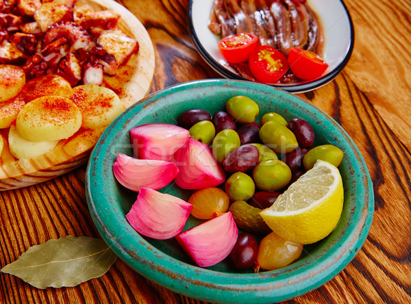 Olives onion pickles tapas anchovies and octopus Stock photo © lunamarina