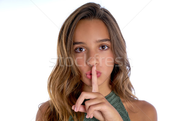 Brunetka teen girl ciszy palec gest biały Zdjęcia stock © lunamarina