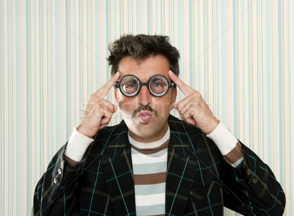 nerd silly crazy myopic glasses man funny gesture Stock photo © lunamarina