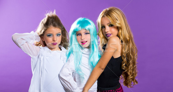 children group of fashiondoll fashion girls on purple Stock photo © lunamarina