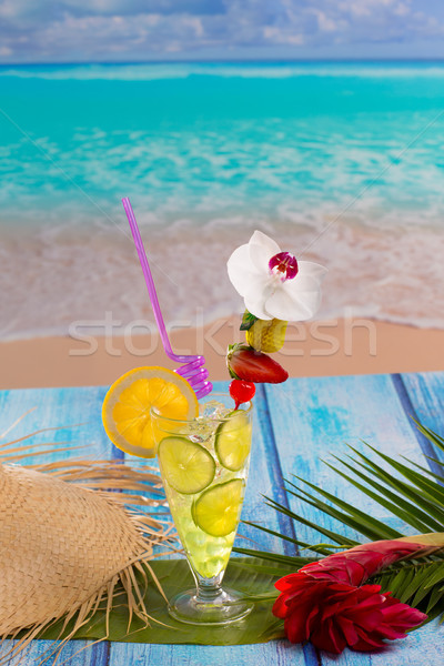 Lemon lime cocktail mojito on tropical beach Stock photo © lunamarina