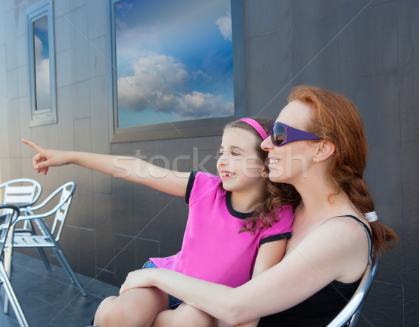 Children girl daughter sitting on mother lap Stock photo © lunamarina