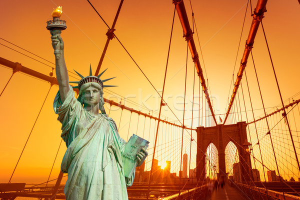 Liberty Statue and Brooklyn bridge New York Stock photo © lunamarina