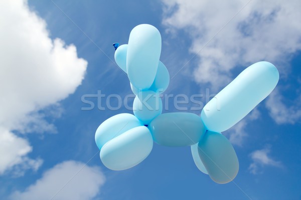 ballon with poodle dog caniche shape fly blue sky Stock photo © lunamarina