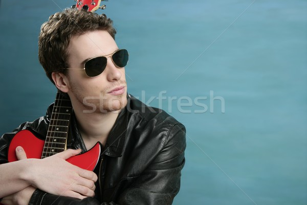 Gitár rocksztár férfi napszemüveg bőrdzseki bőr Stock fotó © lunamarina