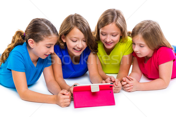 sisters kid girls with tech tablet pc playing happy Stock photo © lunamarina