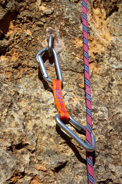 climbing shackles and rope on a rock wal Stock photo © lunamarina