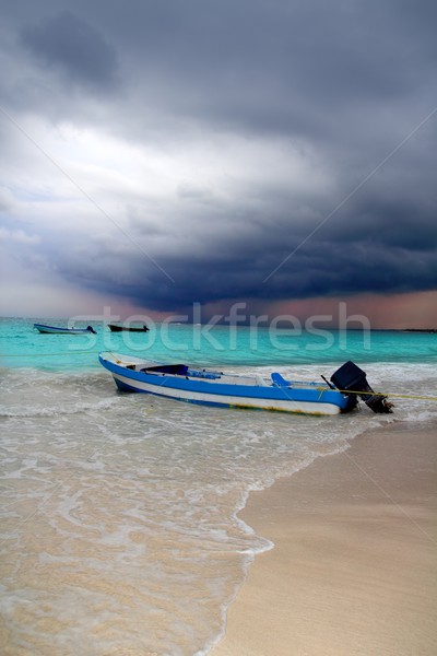 Caribbean before tropical storm hurricane beach boat Stock photo © lunamarina