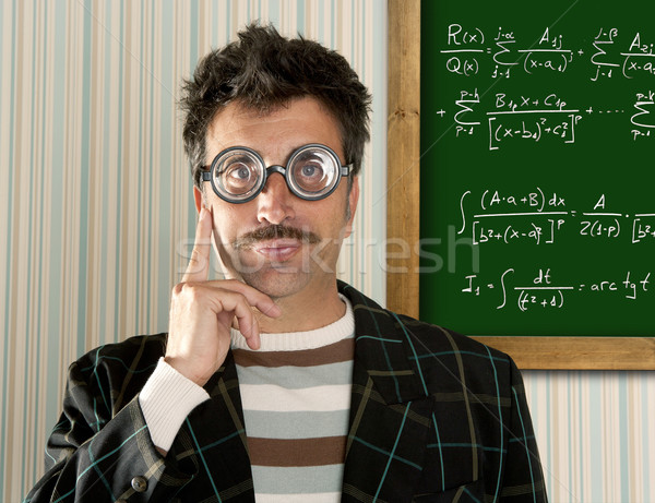 Genius nerd glasses silly man board math formula Stock photo © lunamarina