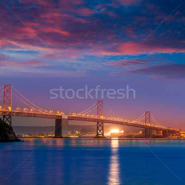 Bay Bridge at sunset in San Francisco California Stock photo © lunamarina