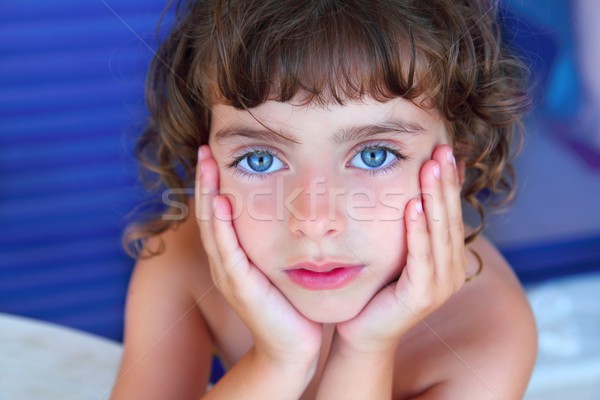 Beautiful blue eyes little girl portrait hands on face Stock photo © lunamarina