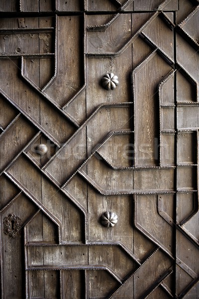 old aged wooden door iron handcraft deco Stock photo © lunamarina