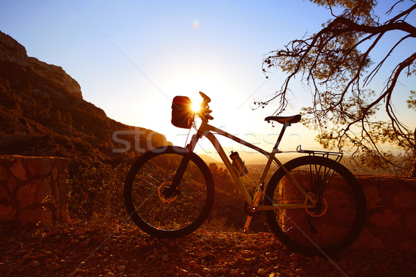 Mountain bike MTB sunset in Denia at Montgo Stock photo © lunamarina