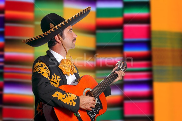 Charro Mariachi playing guitar serape poncho Stock photo © lunamarina