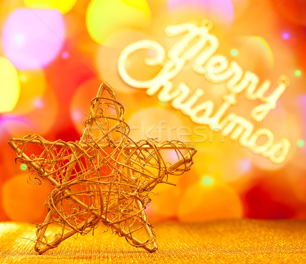 Golden star with Merry Christmas written Stock photo © lunamarina