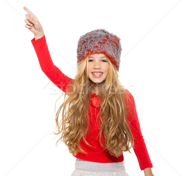 Stock photo: kid girl winter dancing with red shirt and fur hat