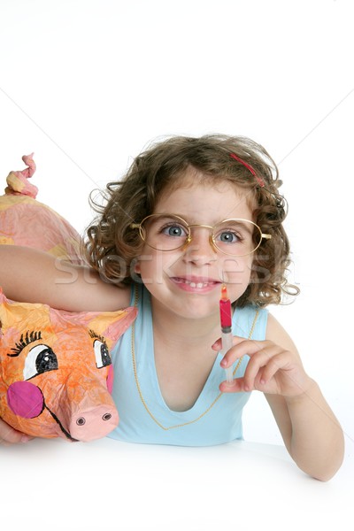 Little girl pretending be veterinary with a pig Stock photo © lunamarina