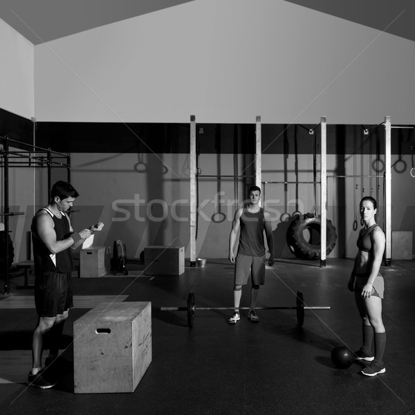 gym group workout barbells slam balls and jump Stock photo © lunamarina