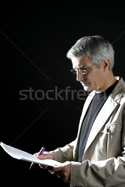 businessman reading at work, senior gray hair Stock photo © lunamarina