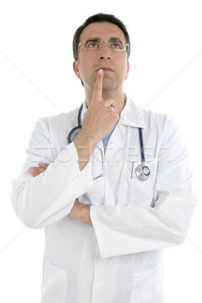 Young doctor with glasses isolated on white Stock photo © lunamarina