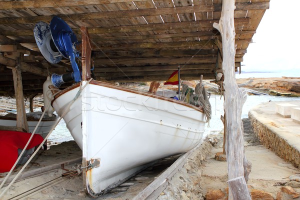 Formentera boat stranded on wooden rails Stock photo © lunamarina