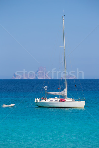 Es Vedra background with sailboat from Formentera Stock photo © lunamarina