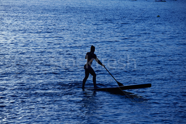 Stand up surf ragazza cielo acqua Foto d'archivio © lunamarina