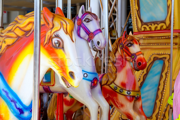 Stock photo: horses in merry go round fairground