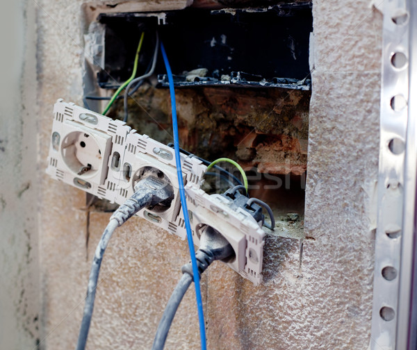 Elétrico plugue melhoramento da casa reparar casa parede Foto stock © lunamarina