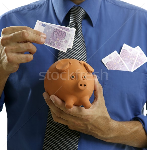 businessman insert euro notes in piggy bank Stock photo © lunamarina