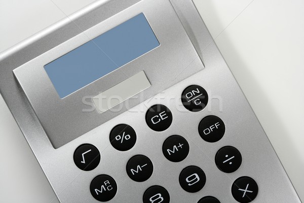 Calculator in gray silver color with solar cell Stock photo © lunamarina