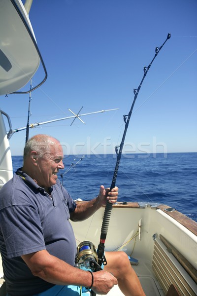 Angler Senior groß Spiel Sport Fischerboot Stock foto © lunamarina