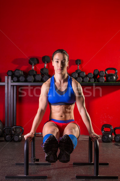 Kadın paralel çubuklar antreman spor salonu egzersiz Stok fotoğraf © lunamarina