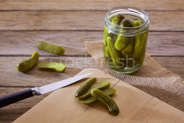 bottled pickles cucumbers in wooden table Stock photo © lunamarina