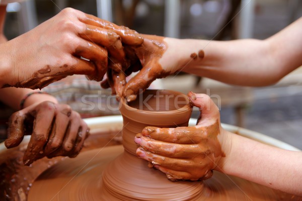 clay potter hands wheel pottery work workshop teacher Stock photo © lunamarina
