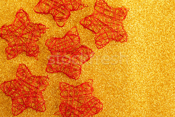christmas golden stars of wire over golden glitter Stock photo © lunamarina