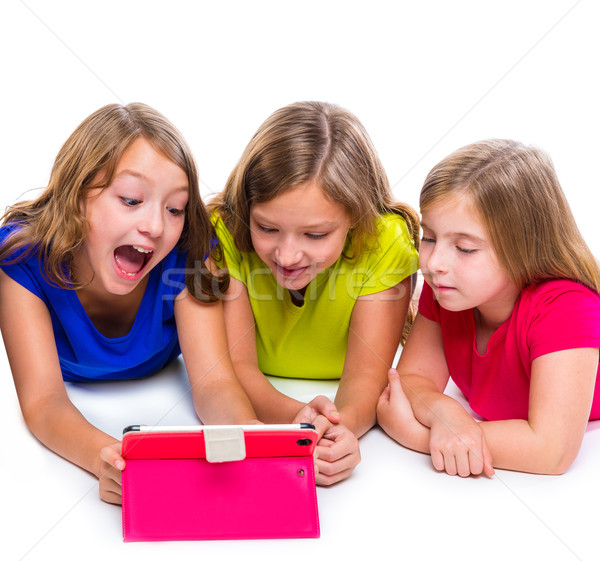 sisters kid girls with tech tablet pc playing happy Stock photo © lunamarina