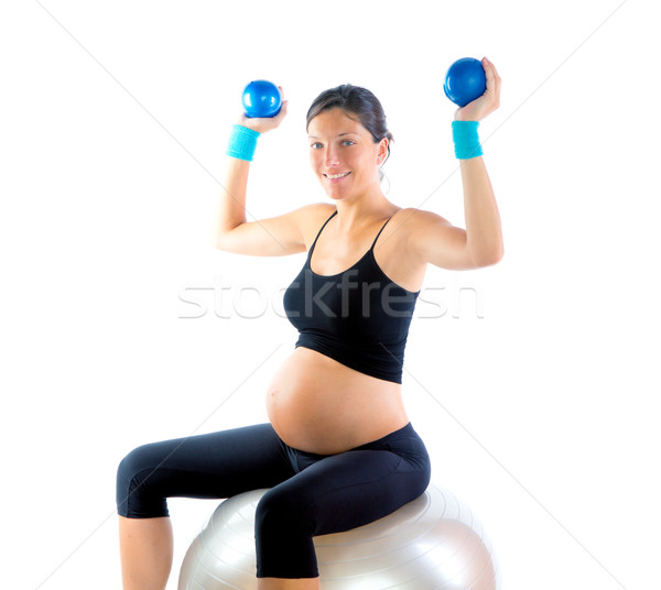 Beautiful pregnant woman at fitness gym Stock photo © lunamarina