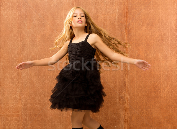 black dress kid girl dancing and twisting vintage Stock photo © lunamarina