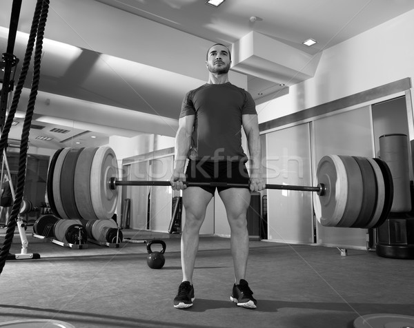 Crossfit fitness gym heavy weight lifting bar man workout Stock photo © lunamarina